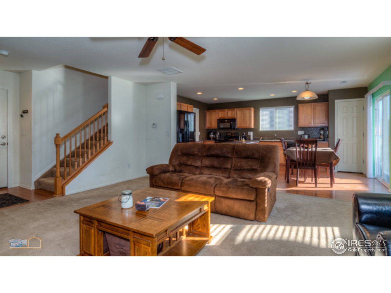 10672 Upper Ridge Road Longmont, CO 80504 - Photo 5 of 25 Living Room into Kitchen