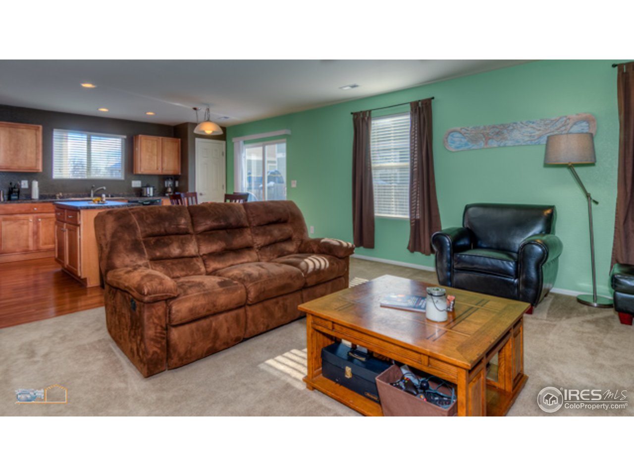 10672 Upper Ridge Road Longmont, CO 80504 - Photo 6 of 25 Living Room into Kitchen 2