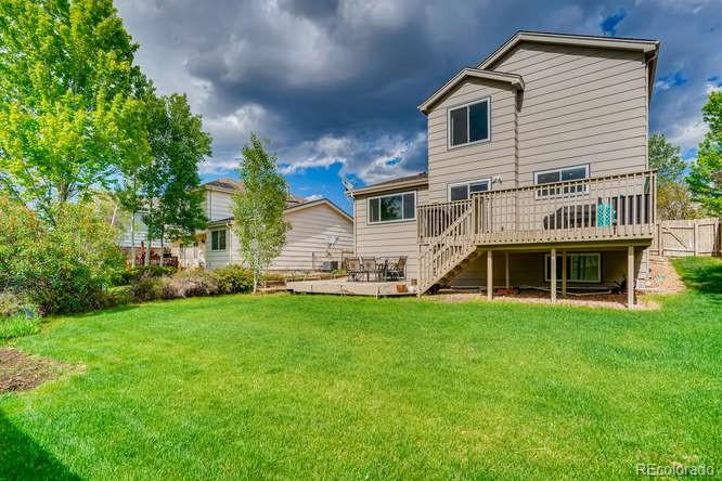 11181 Rodeo Circle Parker, CO 80138 - Photo 25 of 26 a front view of house with yard and green space