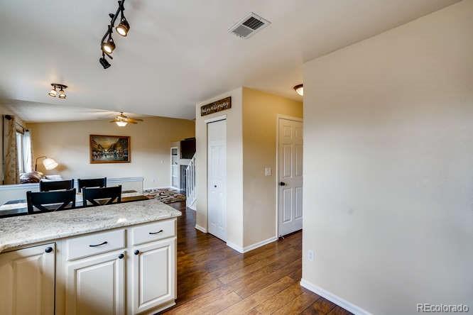 11181 Rodeo Circle Parker, CO 80138 - Photo 7 of 26 a spacious bathroom with a granite countertop sink and a mirror
