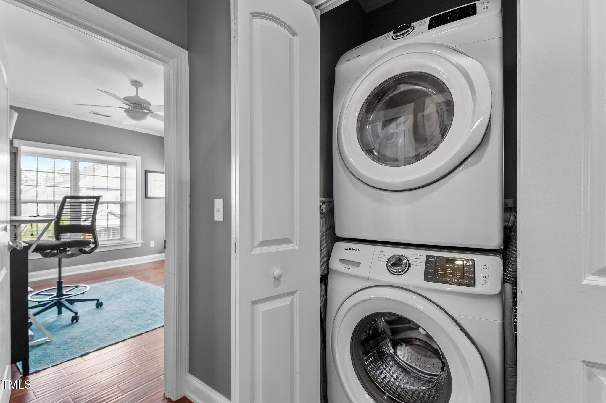 1209 Harp Street Raleigh, NC 27604 - Photo 28 of 39 a view of a hallway with washer and dryer