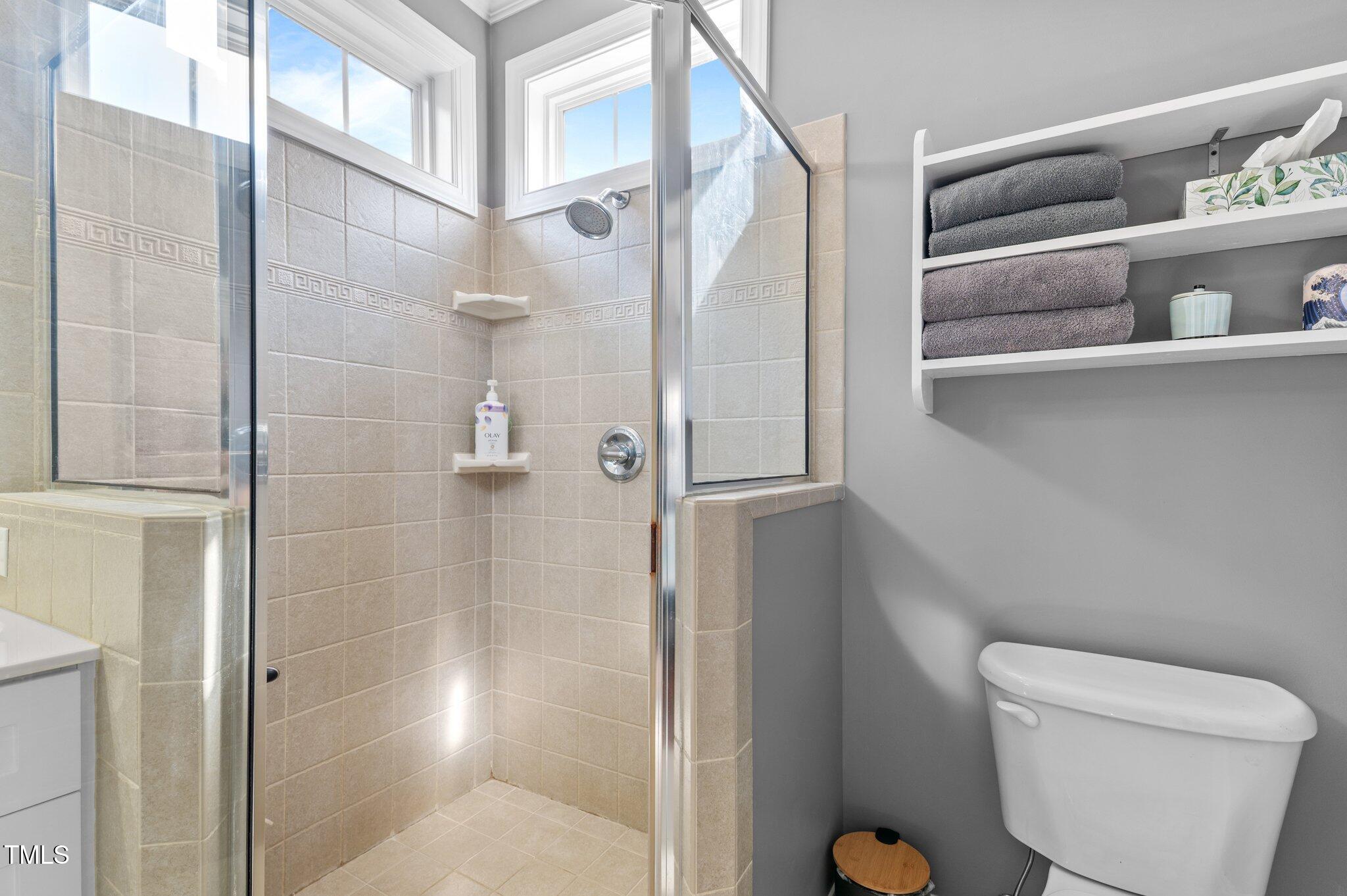1209 Harp Street Raleigh, NC 27604 - Photo 34 of 39 a bathroom with a shower