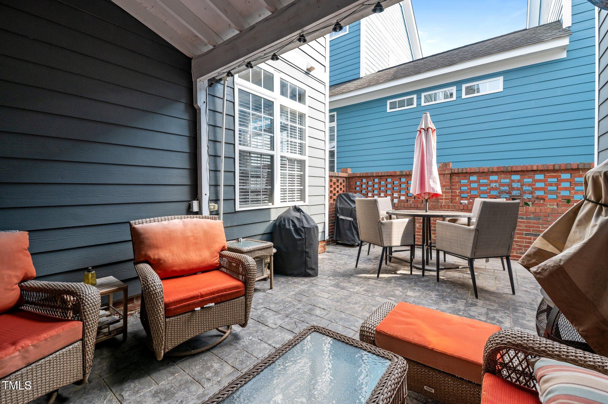1209 Harp Street Raleigh, NC 27604 - Photo 38 of 39 a outdoor living space with patio furniture