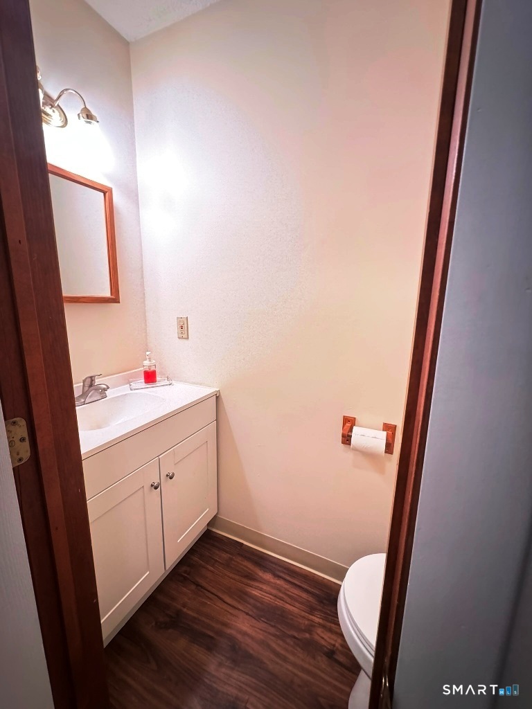 102 Potuccos Ring Road Wolcott, CT 06716 - Photo 12 of 26 Main level half bath