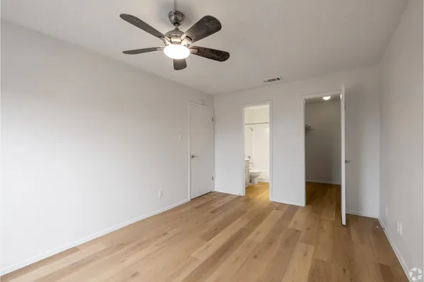an empty room with a bathroom