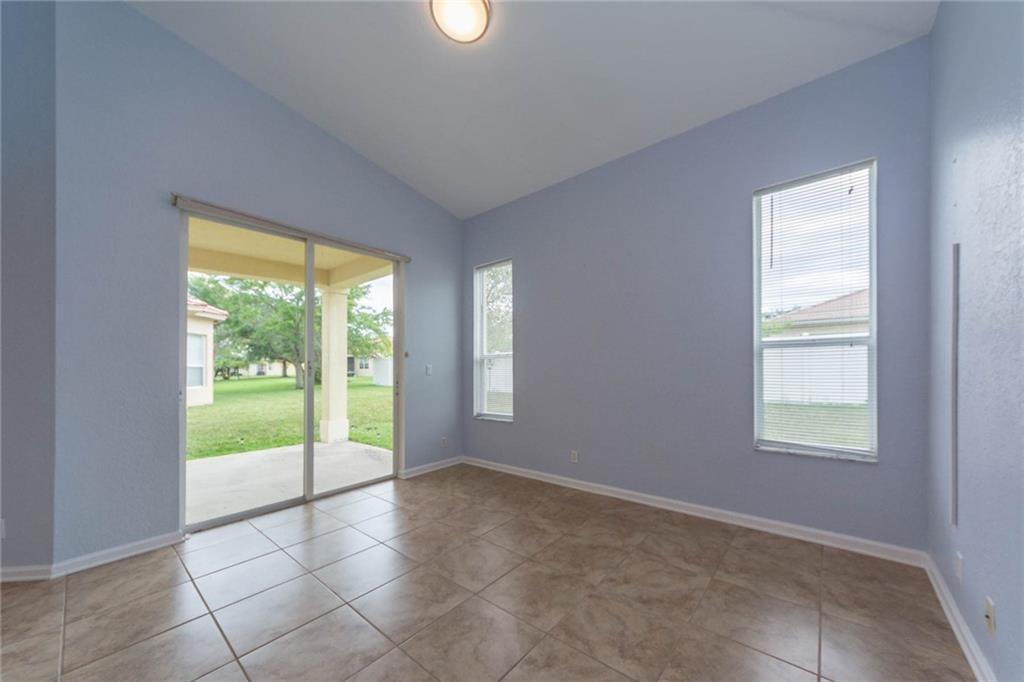 5544 Spanish River Road Fort Pierce, FL 34951 - Photo 12 of 35 a view of an empty room with a window
