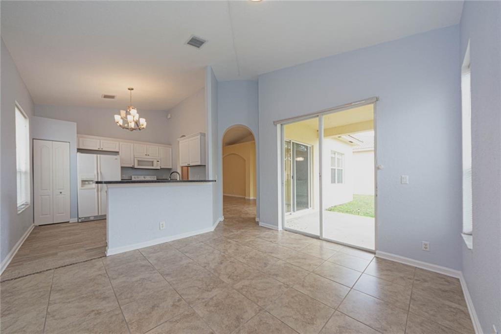 5544 Spanish River Road Fort Pierce, FL 34951 - Photo 13 of 35 a view of a kitchen and a kitchen
