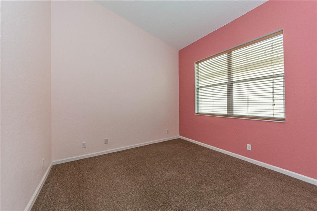 5544 Spanish River Road Fort Pierce, FL 34951 - Photo 20 of 35 an empty room with a window