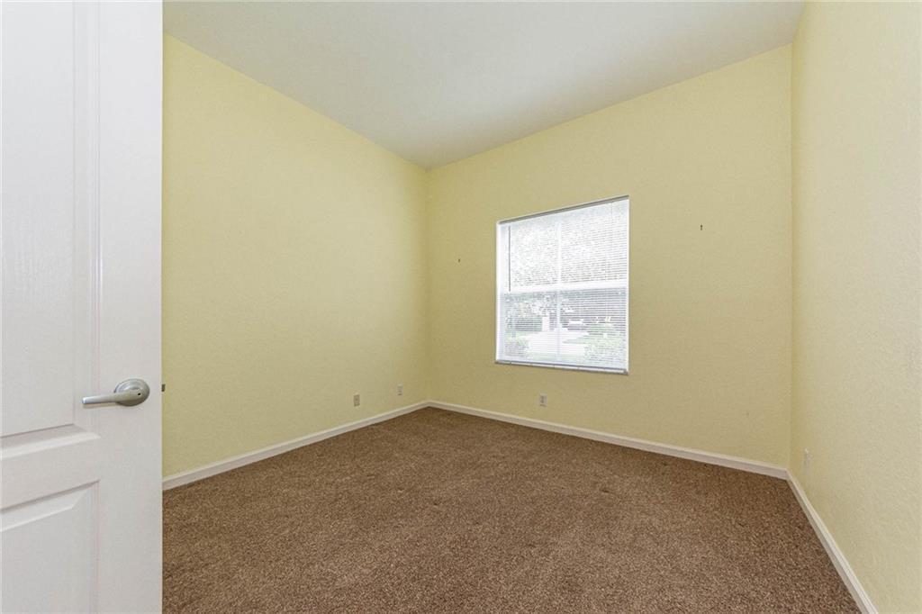 5544 Spanish River Road Fort Pierce, FL 34951 - Photo 22 of 35 a view of an empty room with a window