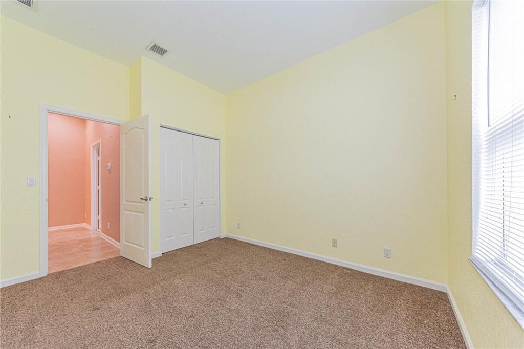 5544 Spanish River Road Fort Pierce, FL 34951 - Photo 23 of 35 a view of an empty room and a window