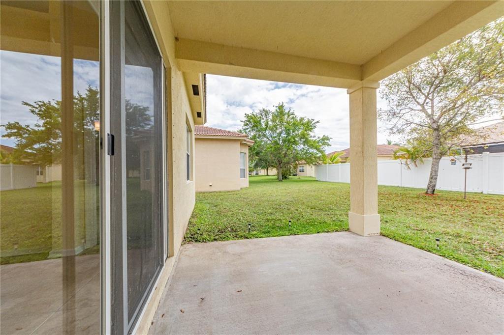 5544 Spanish River Road Fort Pierce, FL 34951 - Photo 26 of 35 a view of a porch with garden