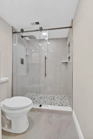 a view of room with window and hardwood floor