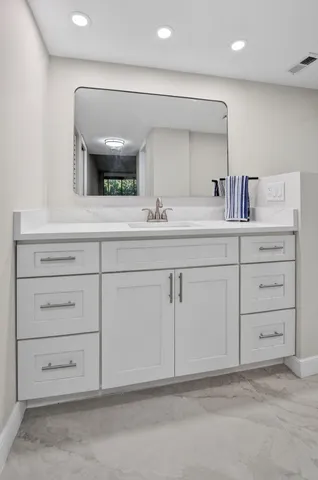 a bathroom with a shower and a toilet