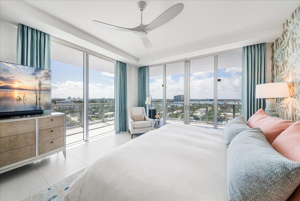 3100 North Ocean Drive, Unit P905 Singer Island, FL 33404 - Photo 11 of 42 a large bedroom with a large bed and a large window