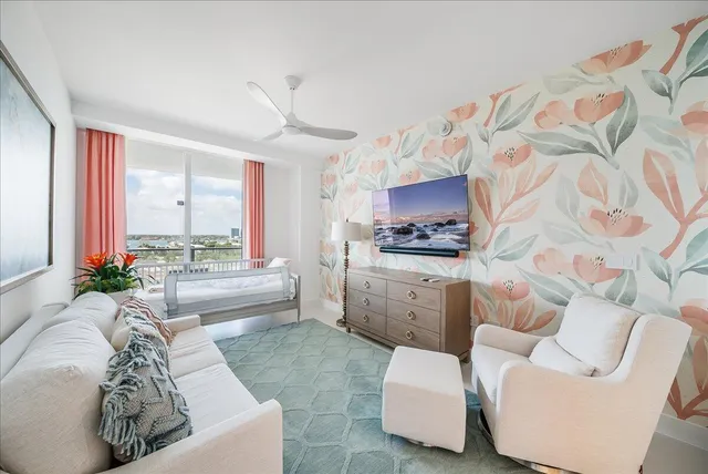 a bedroom with a large bed and a large window