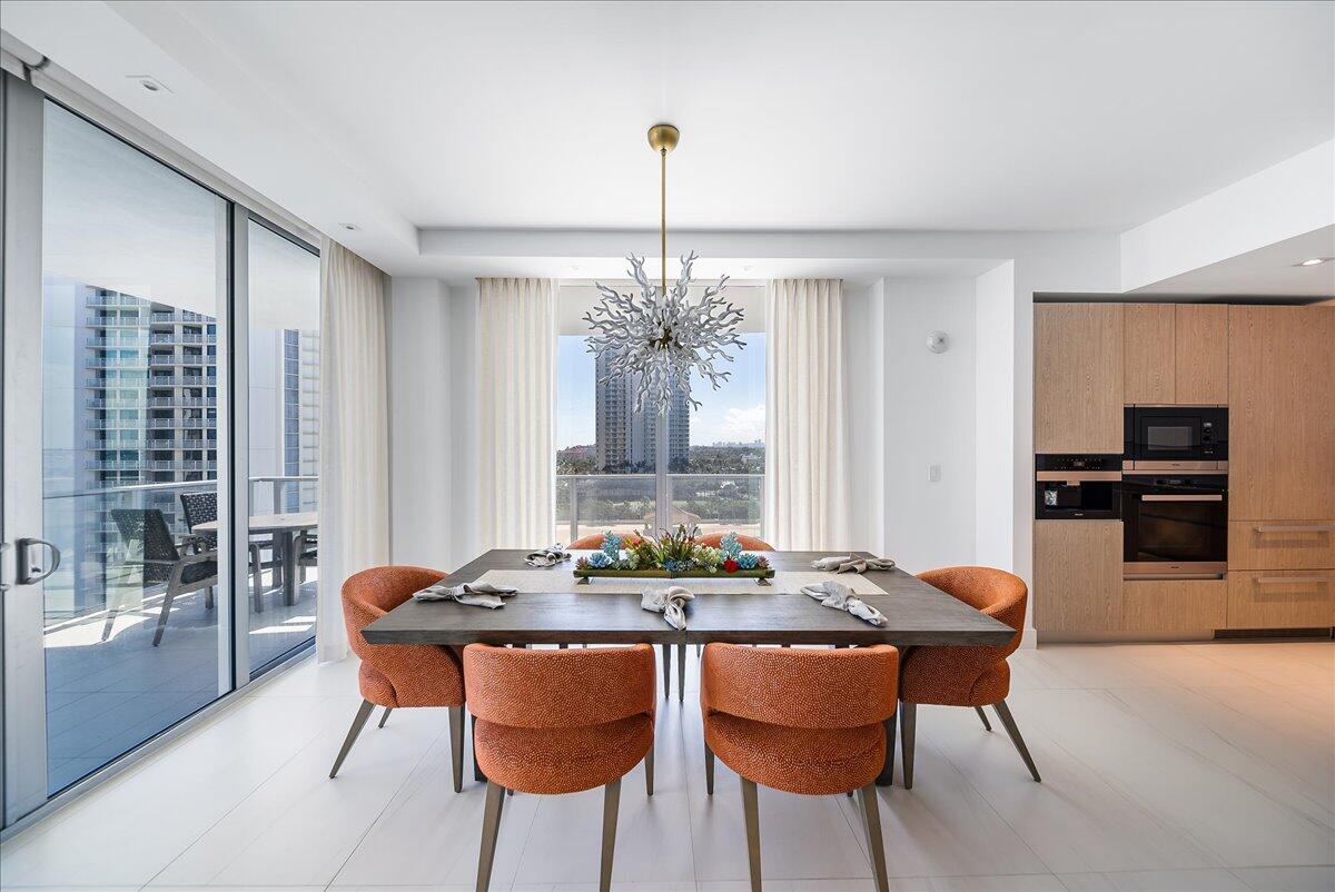 3100 North Ocean Drive, Unit P905 Singer Island, FL 33404 - Photo 6 of 42 a dining room with furniture and window