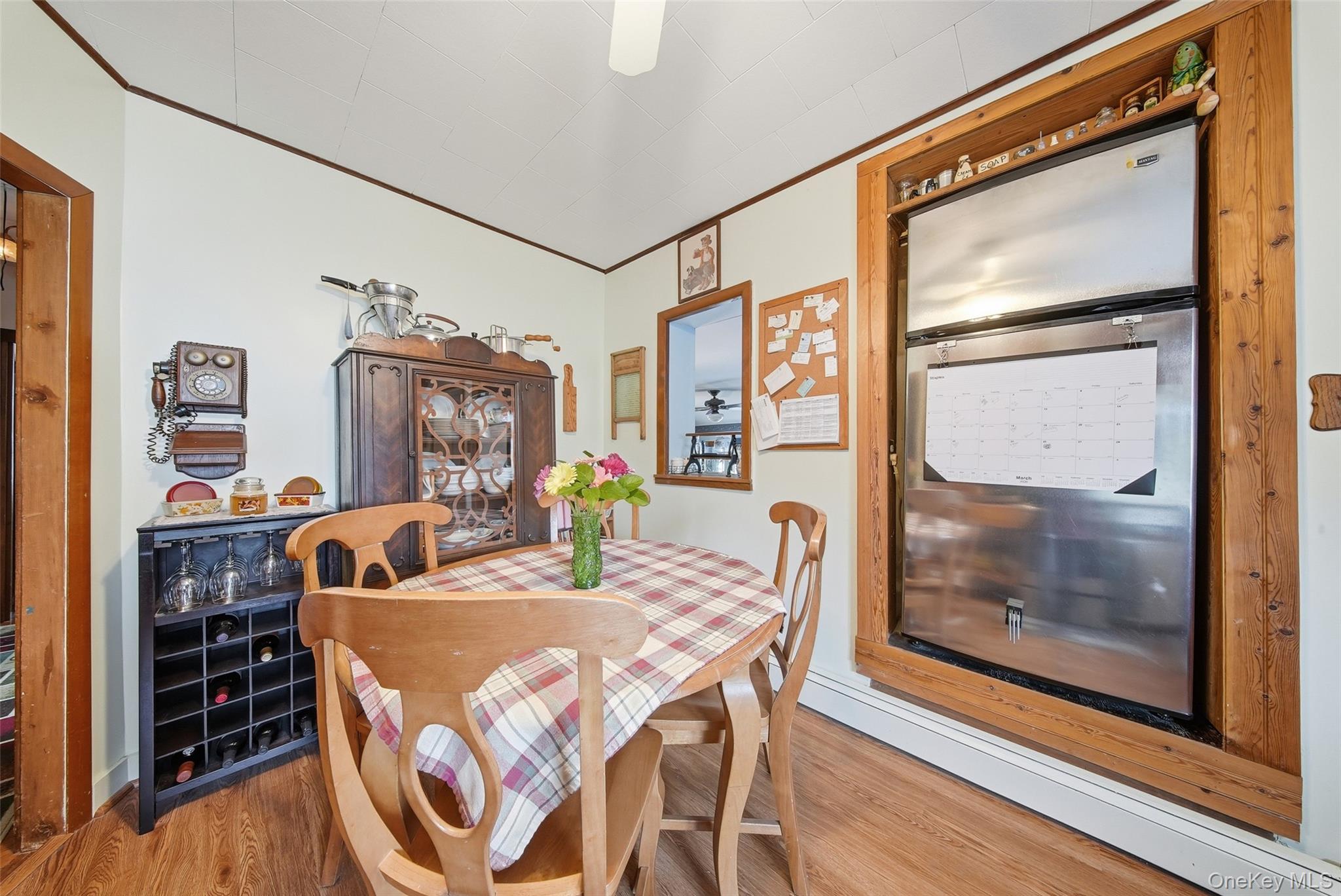 5003 Searsville Road Pine Bush, NY 12566 - Photo 12 of 40 a view of a dining room with furniture window and wooden floor
