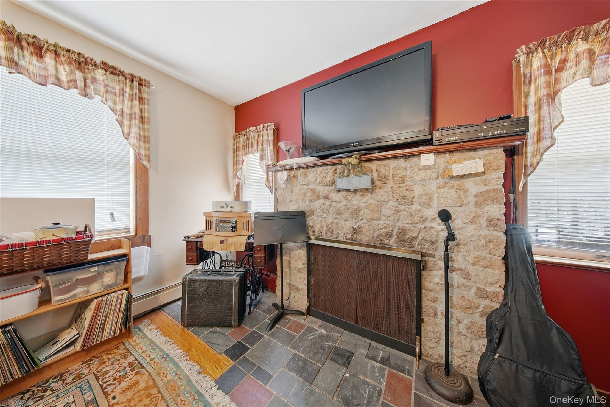 5003 Searsville Road Pine Bush, NY 12566 - Photo 19 of 40 a room with furniture a flat screen tv and rug