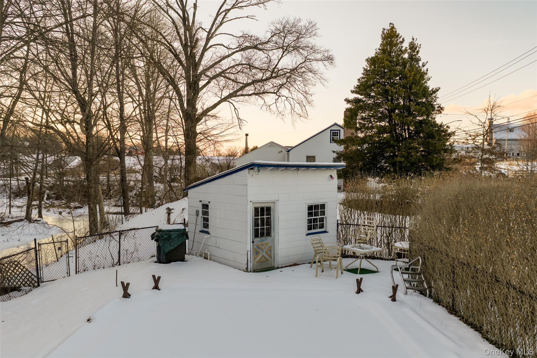 5003 Searsville Road Pine Bush, NY 12566 - Photo 30 of 40 a view of a terrace with a bench and trees