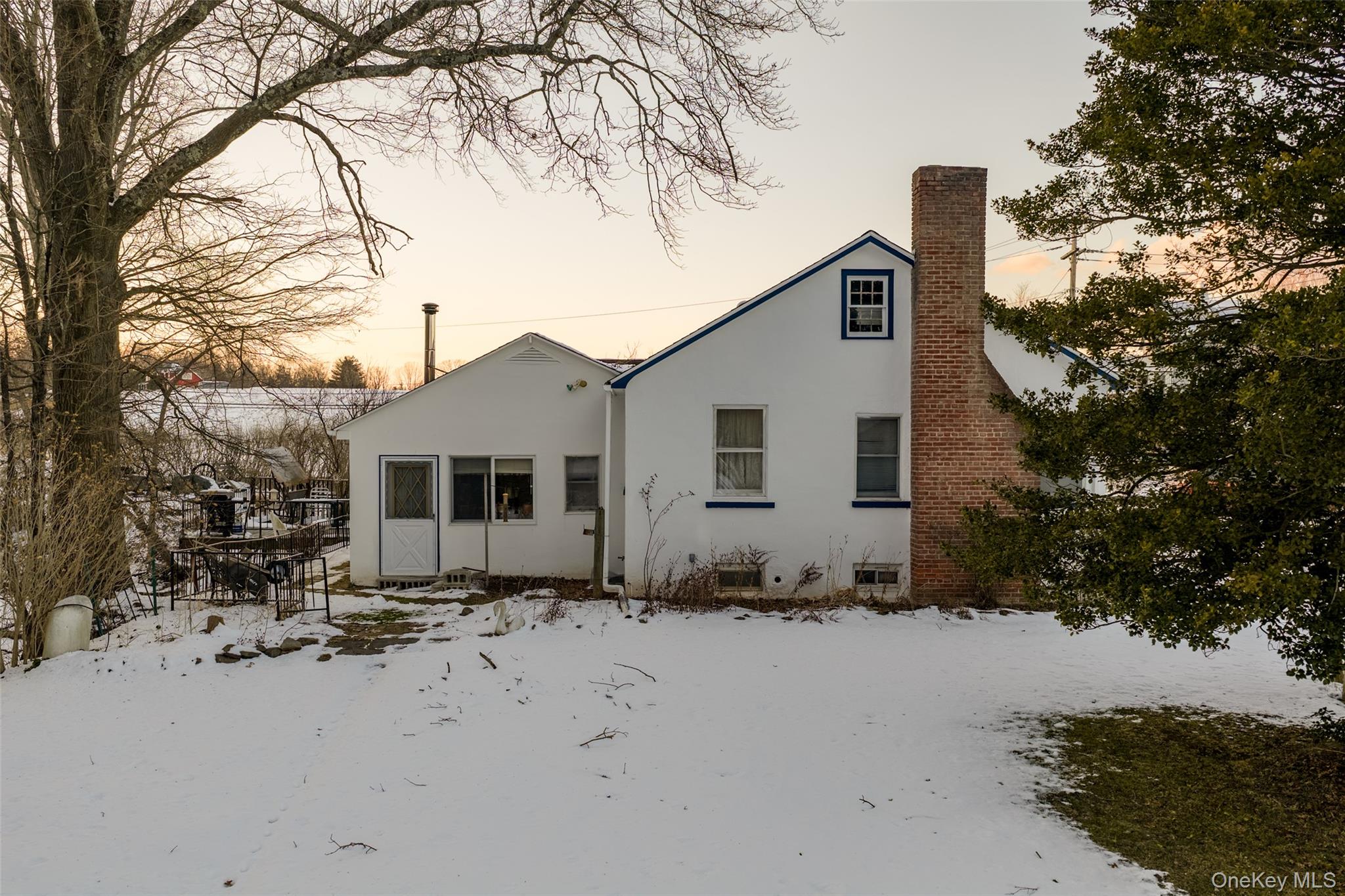 5003 Searsville Road Pine Bush, NY 12566 - Photo 33 of 40 a view of a house with a snow in the background