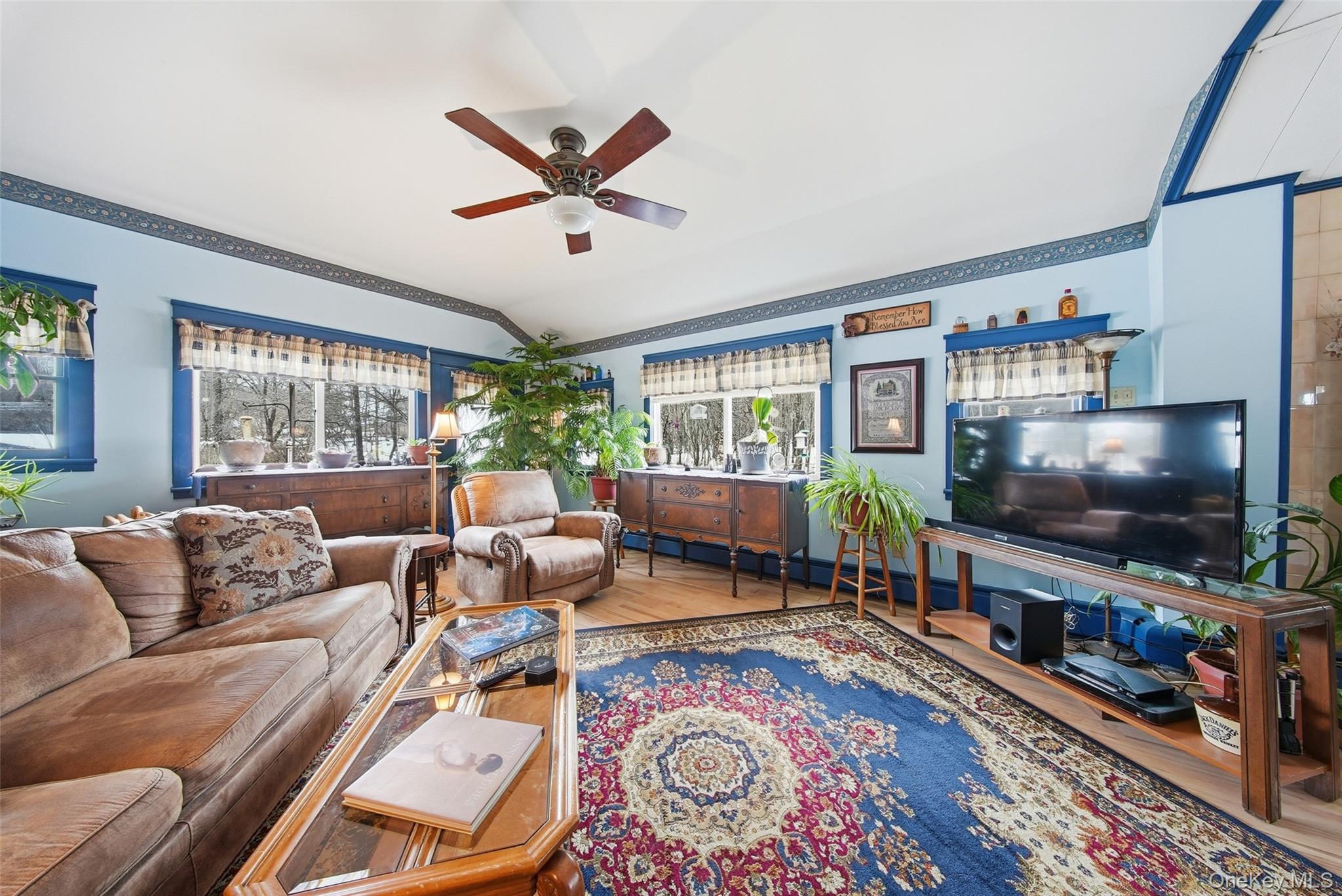 5003 Searsville Road Pine Bush, NY 12566 - Photo 7 of 40 a living room with furniture and a flat screen tv