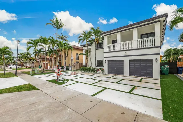 a house with yard in front of it