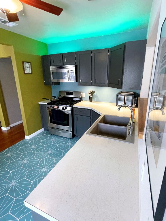 1131 Ebert Avenue Austin, TX 78721 - Photo 6 of 12 a kitchen with a sink appliances and cabinets