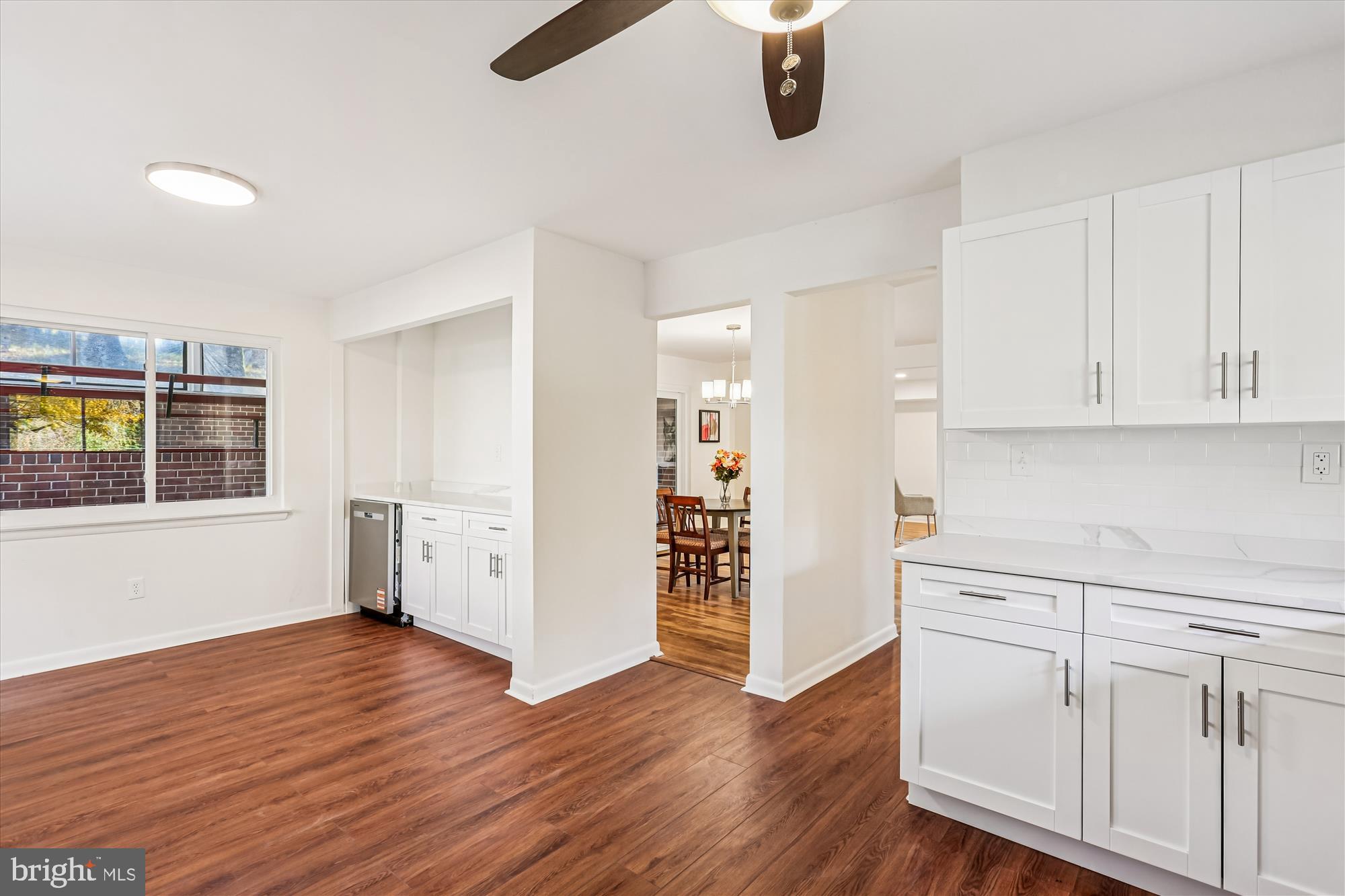 420 Lamberton Drive Silver Spring, MD 20902 - Photo 16 of 46 a view of a kitchen with wooden floor and electronic appliances