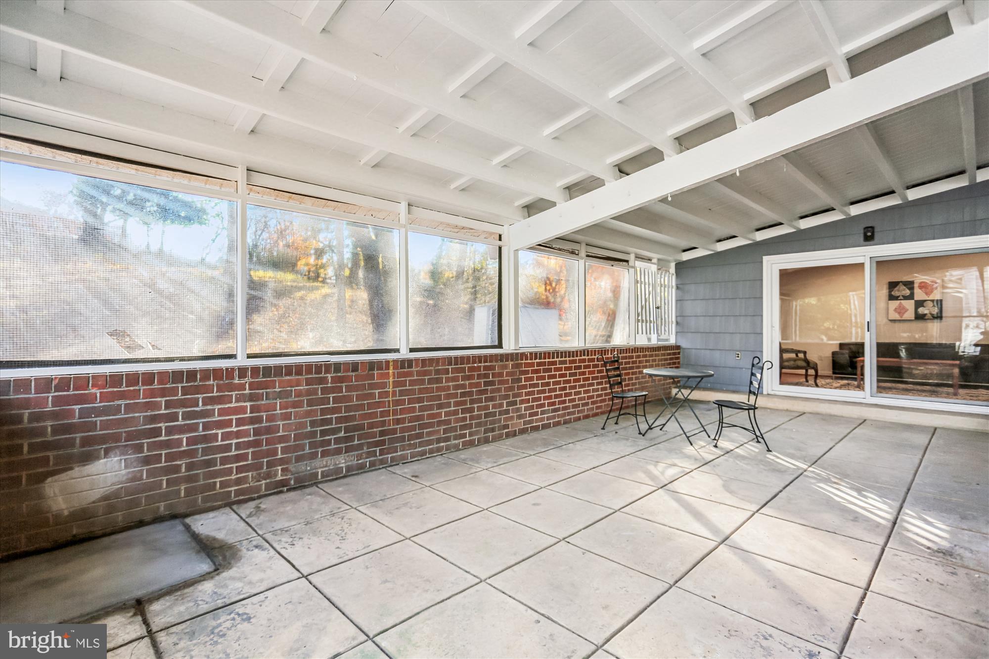 420 Lamberton Drive Silver Spring, MD 20902 - Photo 20 of 46 a room with lots of tables and a large window