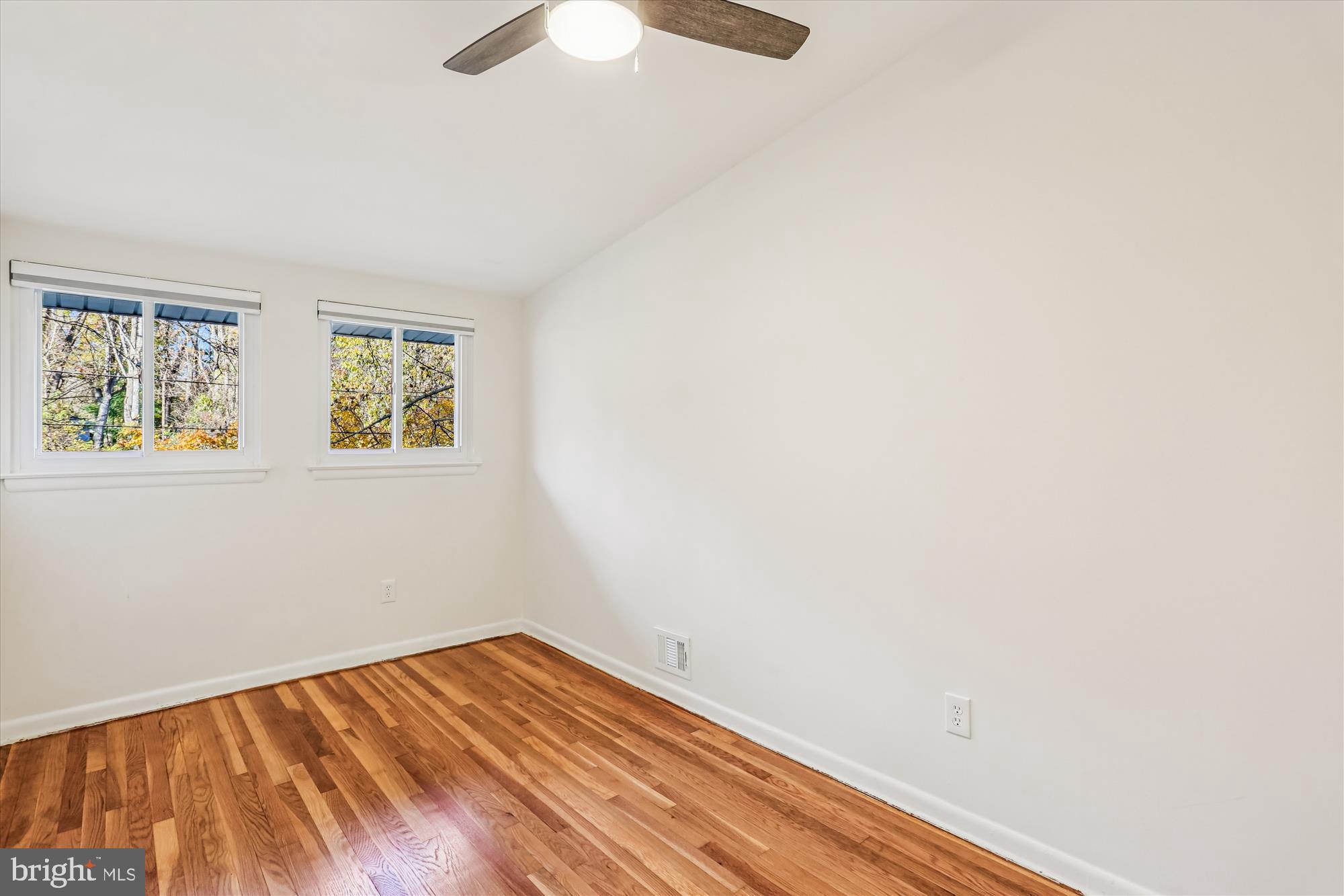420 Lamberton Drive Silver Spring, MD 20902 - Photo 30 of 46 a view of empty room with wooden floor
