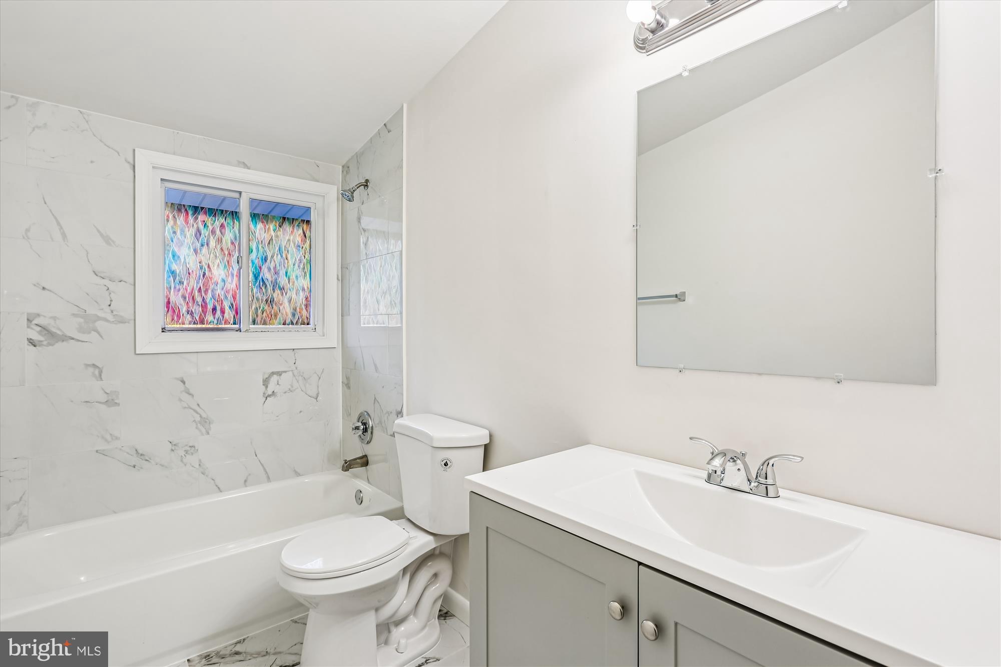 420 Lamberton Drive Silver Spring, MD 20902 - Photo 31 of 46 a bathroom with a sink toilet and bathtub