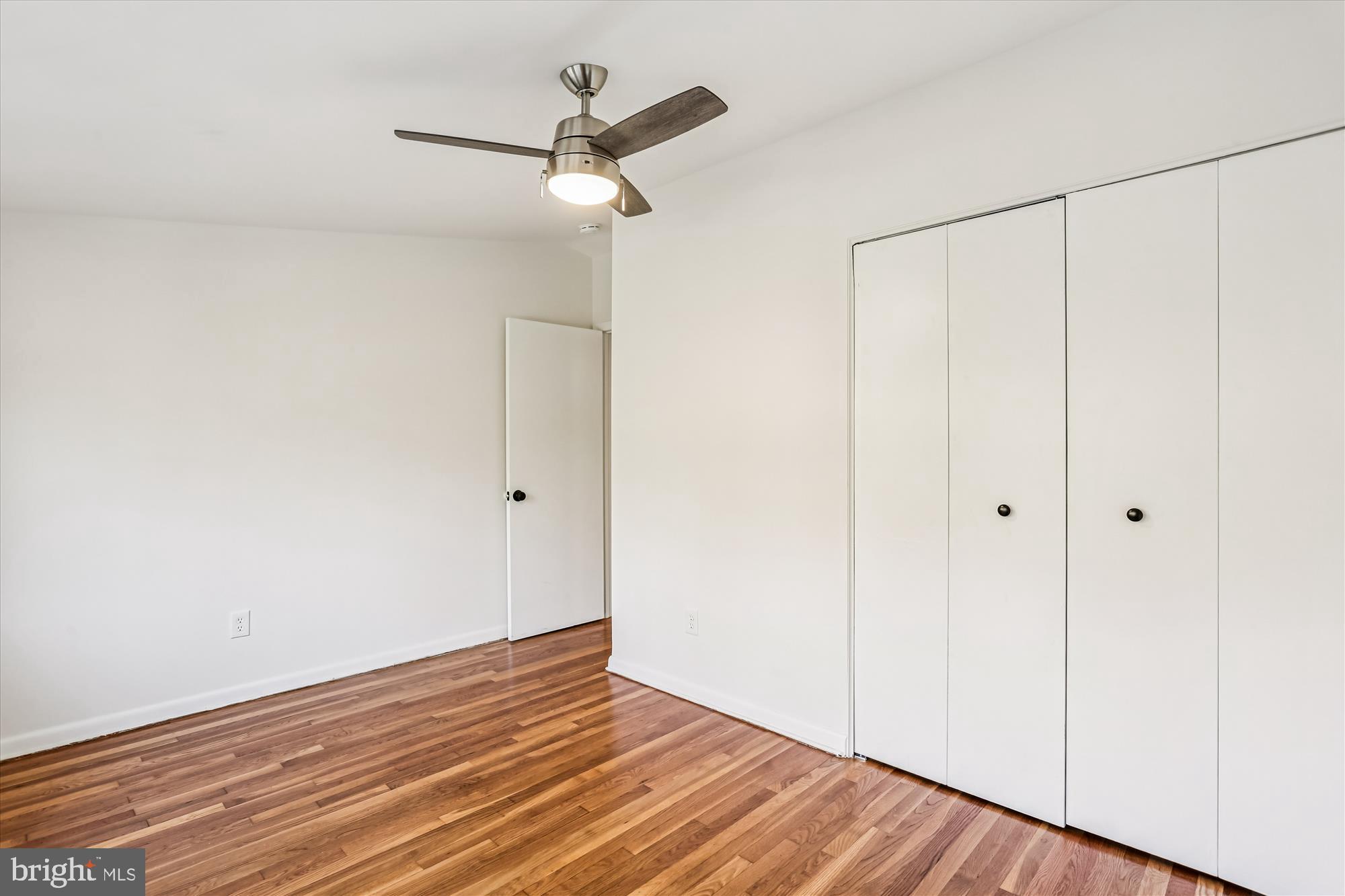 420 Lamberton Drive Silver Spring, MD 20902 - Photo 33 of 46 a view of a room with wooden floor