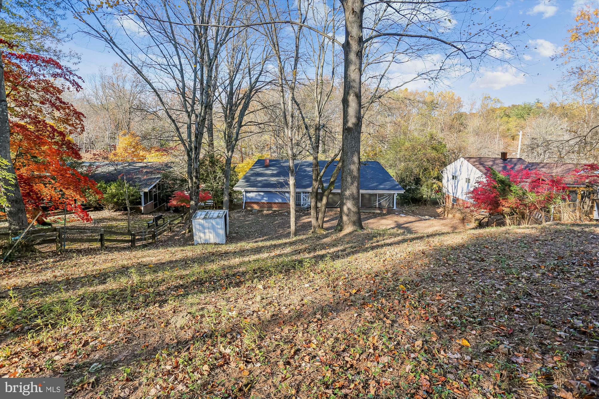420 Lamberton Drive Silver Spring, MD 20902 - Photo 42 of 46 a view of a house with a yard covered in snow