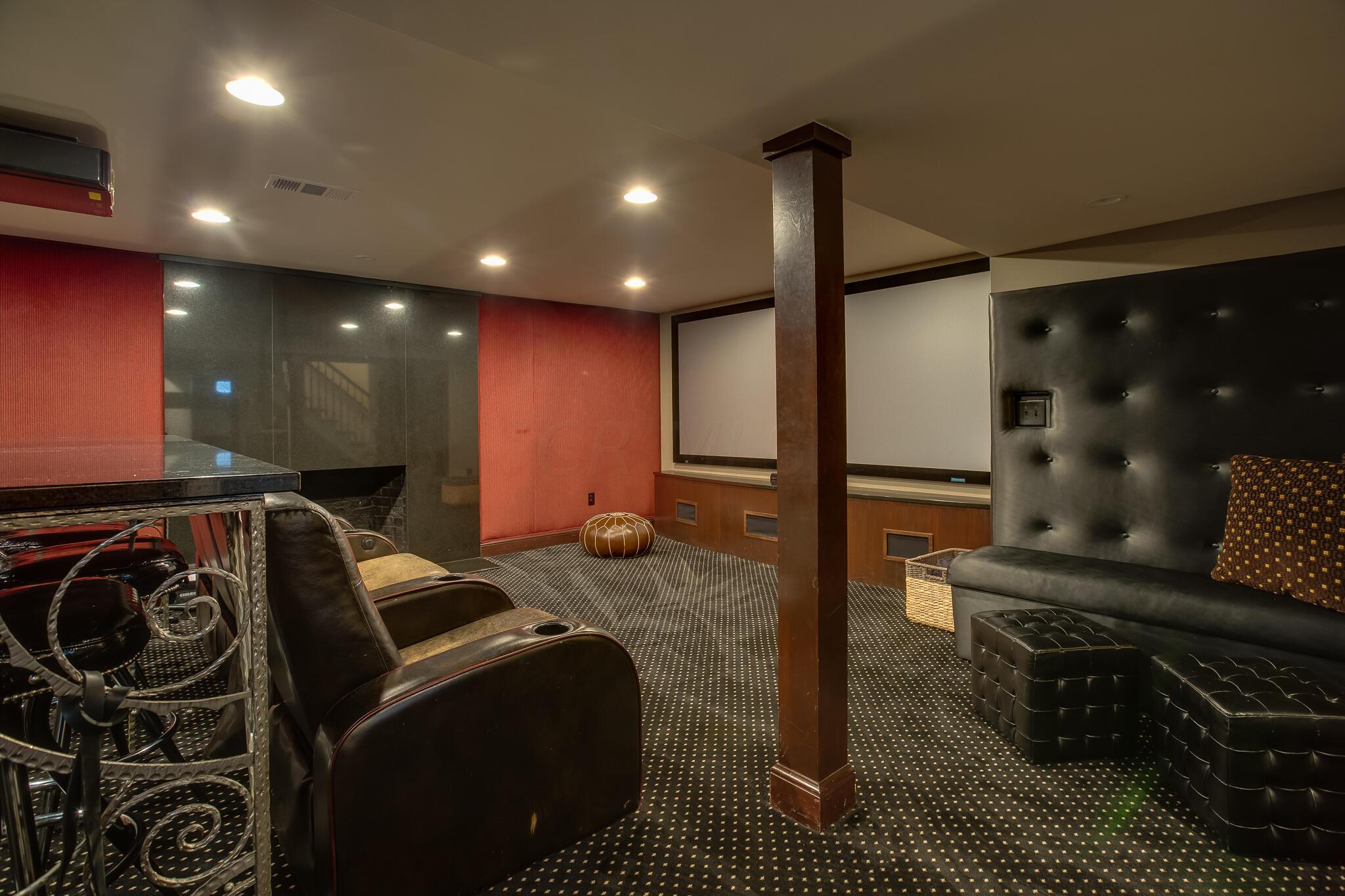 2252 Tremont Road Columbus, OH 43221 - Photo 70 of 97 Remodeled basement with stunning bar, sitting areas, and cinema seating with movie screen.