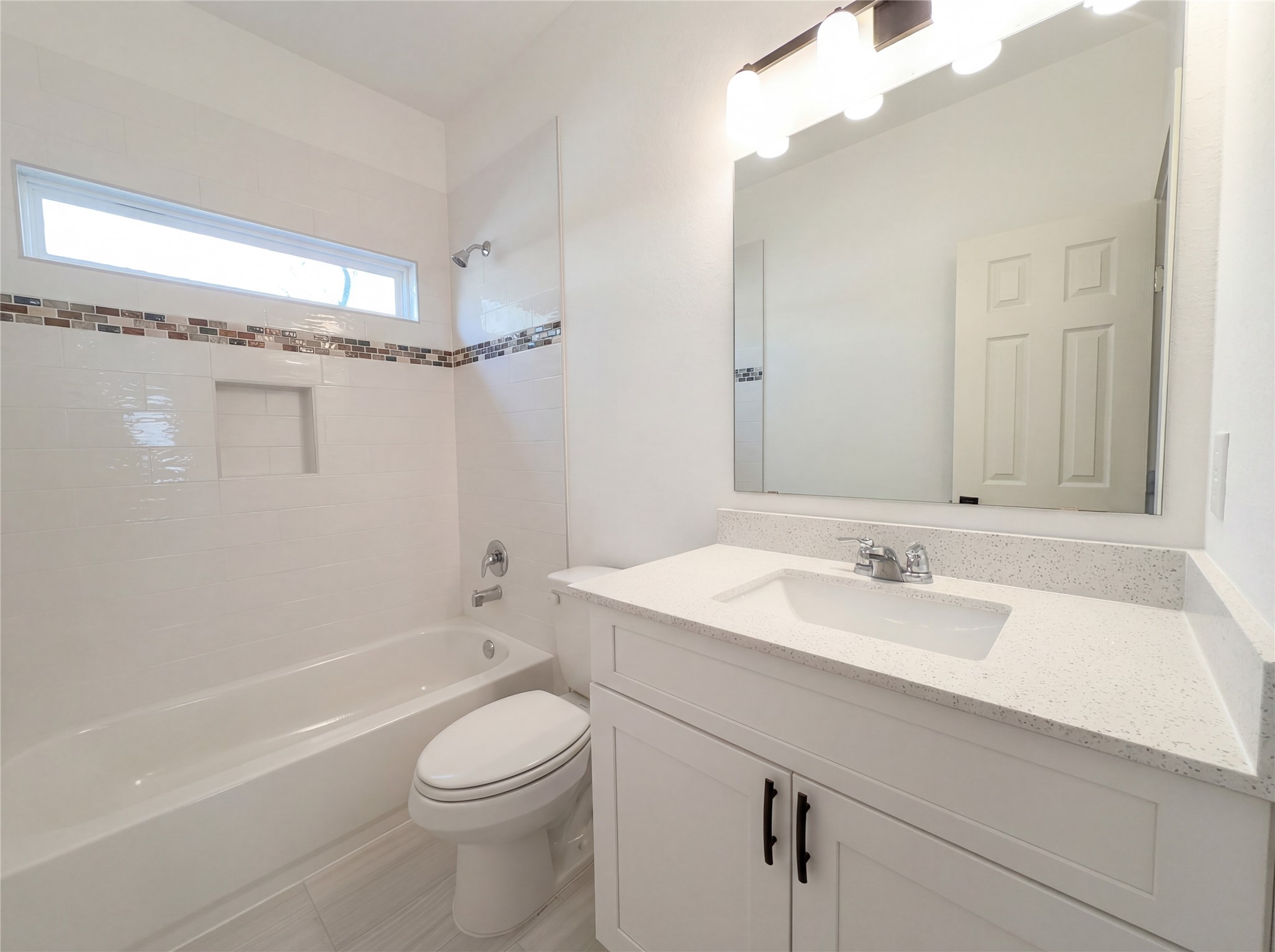 15376 Coaltown Road Willis, TX 77378 - Photo 13 of 17 a bathroom with a sink a toilet and shower