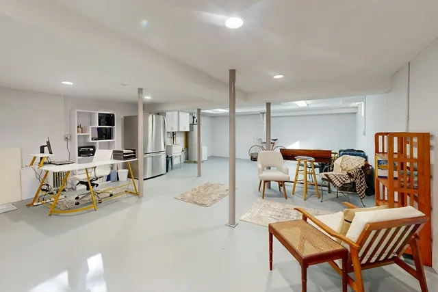 a living room with furniture and a table