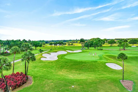 a view of a golf course with a garden