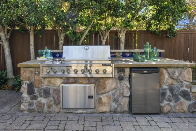 a table and chairs sitting in a backyard