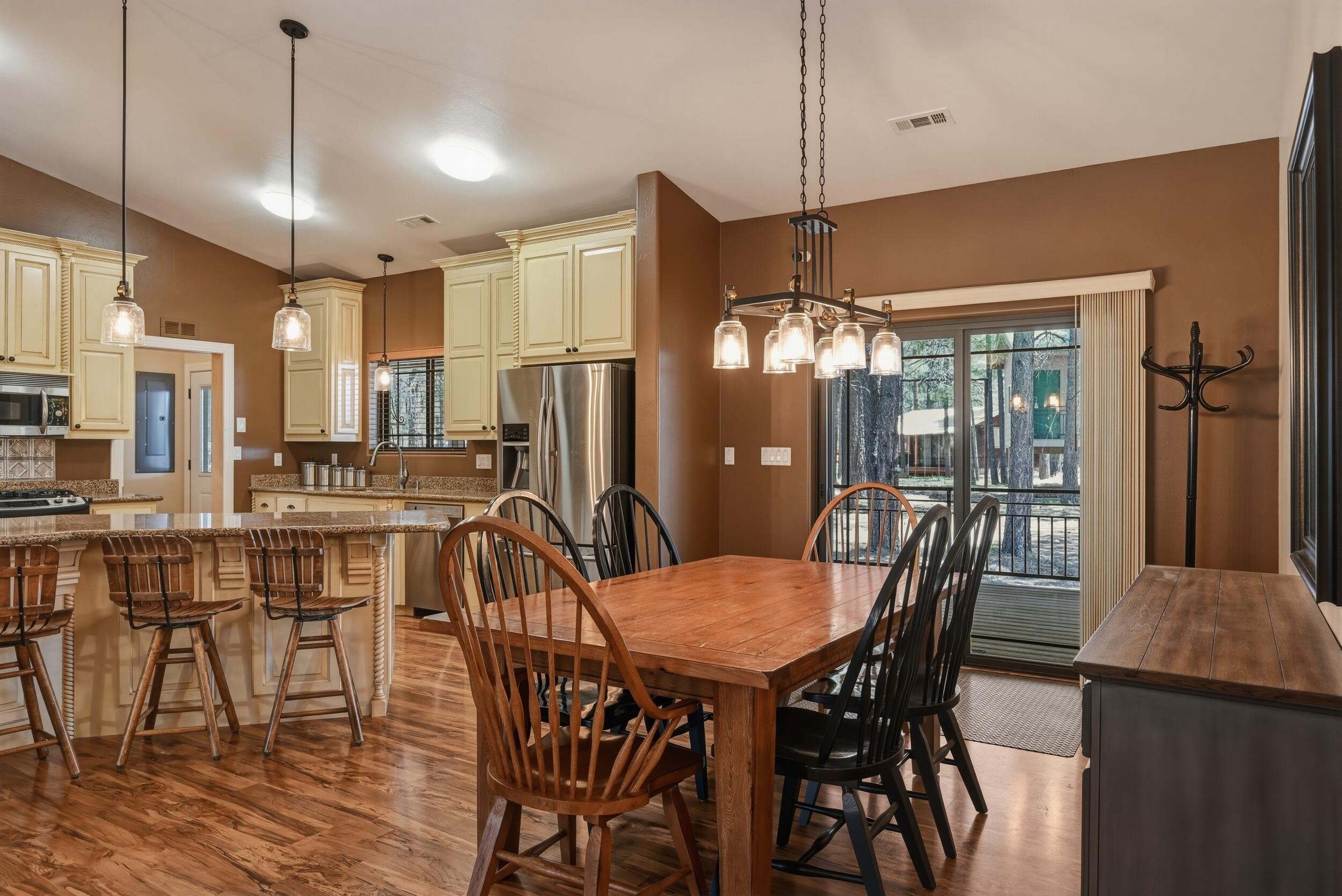 1233 Merzville Road Forest Lakes, AZ 85931 - Photo 9 of 39 a view of a dining room with furniture