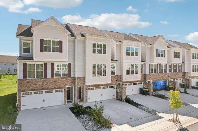 a view of a white building among the street