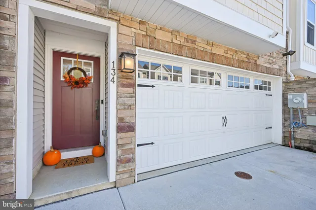 a front view of a building with a lot of windows