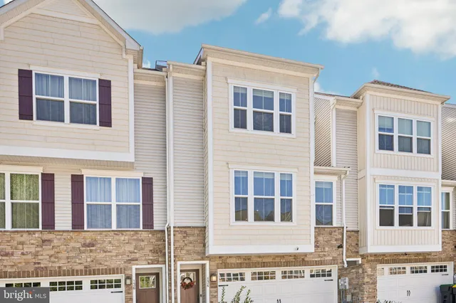 a view of a white building among the street