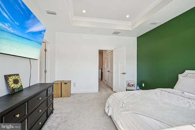 an aerial view of a house with a lake view