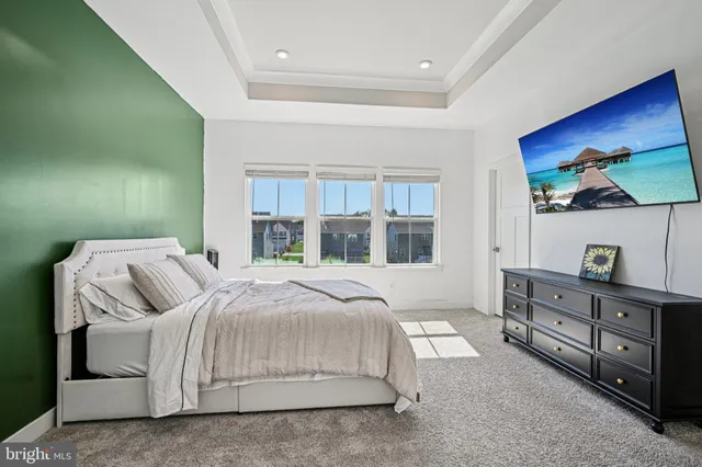 an aerial view of a house with swimming pool