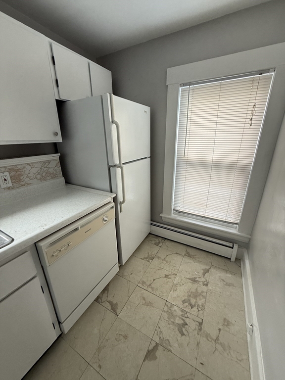 1 Jay Street, Unit 2 Cambridge, MA 02139 - Photo 12 of 14 a utility room with dryer and washer