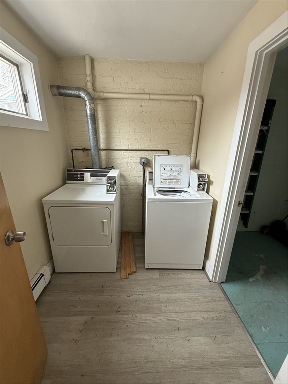 1 Jay Street, Unit 2 Cambridge, MA 02139 - Photo 13 of 14 a utility room with dryer and washer