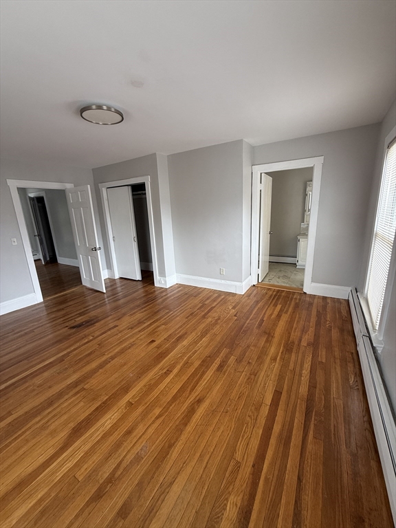 1 Jay Street, Unit 2 Cambridge, MA 02139 - Photo 4 of 14 a large room with wooden floor and windows