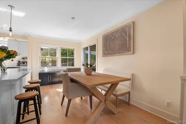 a kitchen with a table and chairs in it