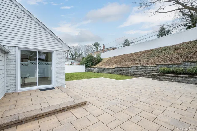 a view of swimming pool with a yard