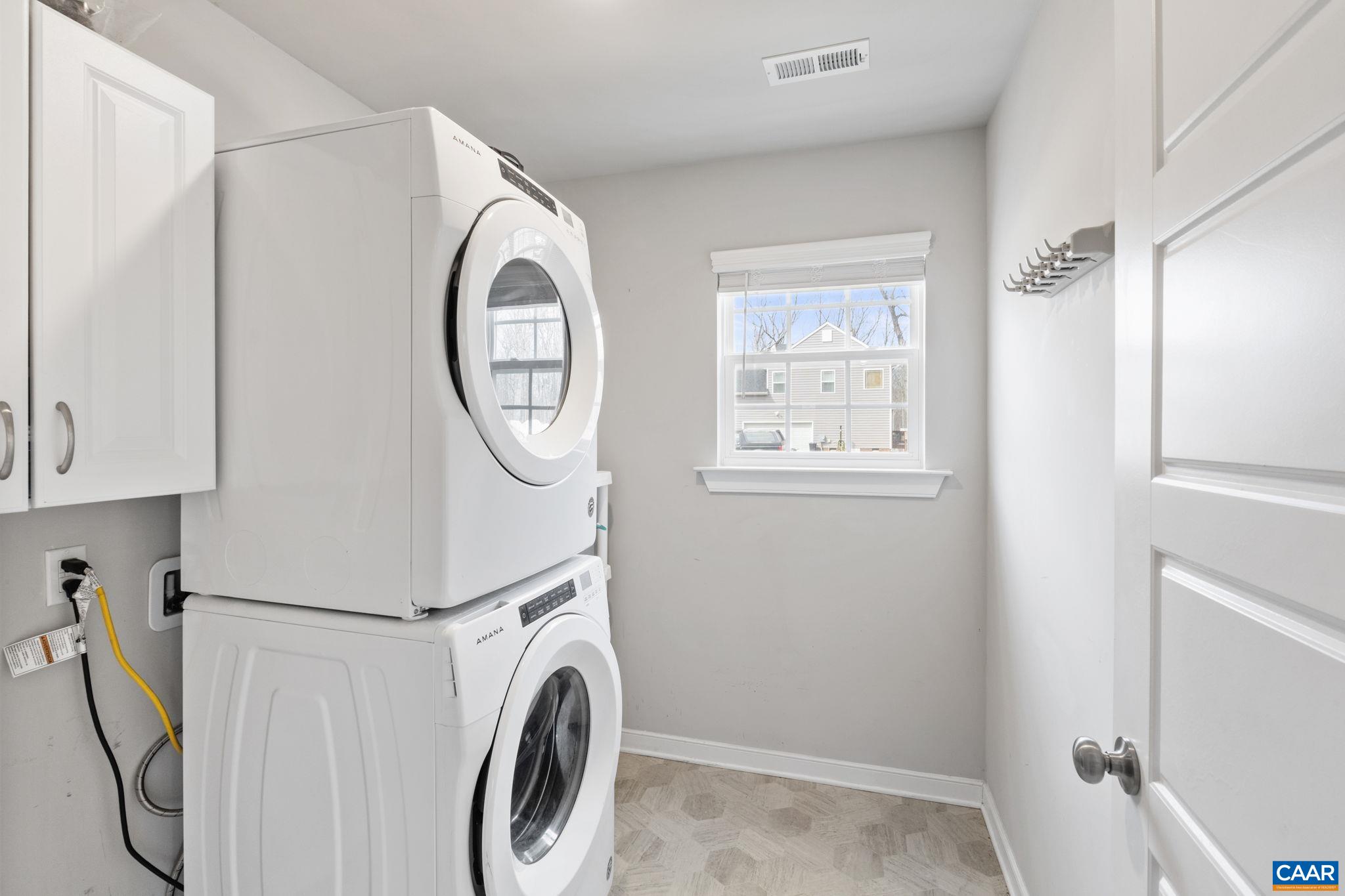 1075 Pine Crest Drive Troy, VA 22974 - Photo 23 of 25 a utility room with dryer and washer